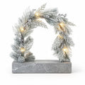Frosted artificial foliage arch with built-in LED lights and stone base 30 x 20 x 40cm