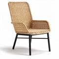 Woven rattan chair with black metal legs for indoor or outdoor use